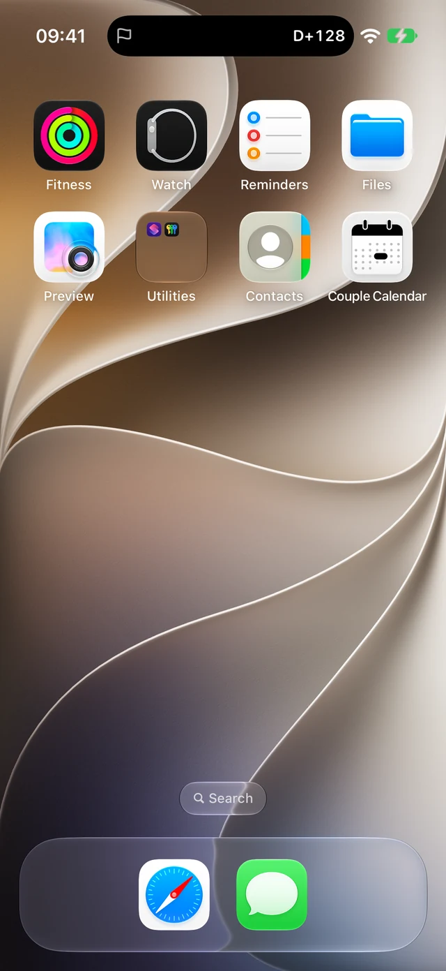 iPhone Home Screen with a compact D+128 display in Dynamic Island at the top