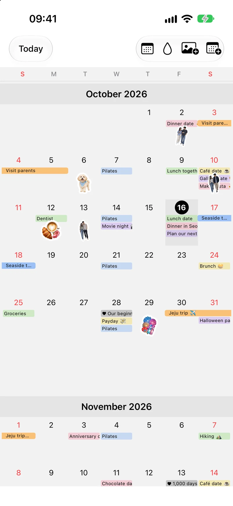 October 2026 month view with photo stickers and colored bars